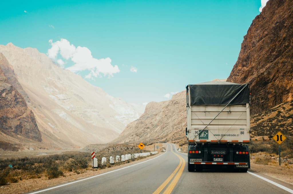 HGV truck driving on a mountain road